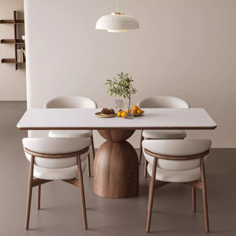 Oak Inside Dining room with a modern table and chairs, featuring a neutral color palette.